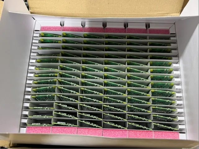 Open carton of Raspberry Pi CM4101008 Compute Module 4 units seated in anti-static trays